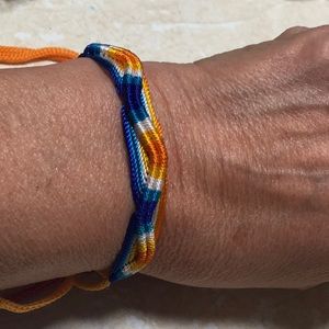 5 Braided bracelets very colorful.  Size 9 1/2”